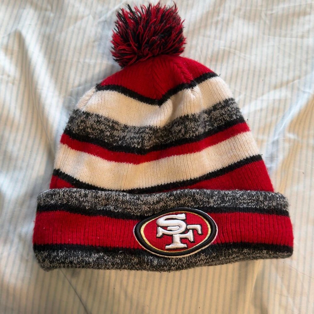 New Era San Francisco 49ers NFL Striped Cuffed Pom Beanie Hat  #NFL #winterwear